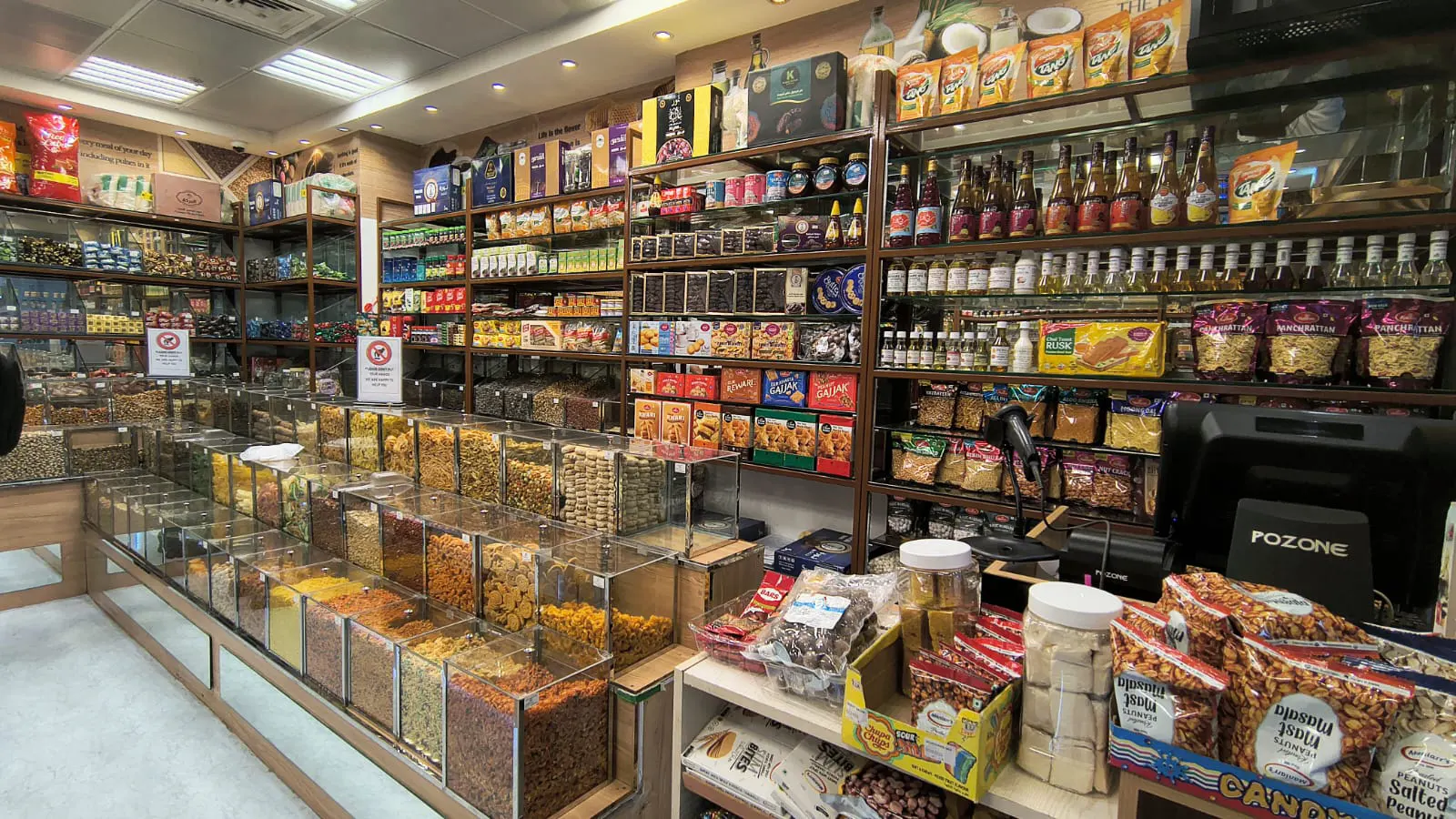 Rukn Al Mathaq Premium Grocery Store Interior Sharjah displaying wide range of spices pulses rice and nuts